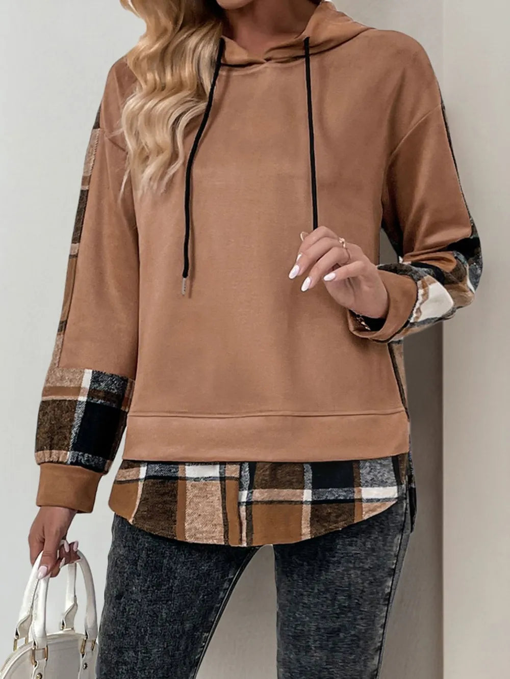 Camel hoodie with black drawstring, plaid hem panel, long sleeves and kangaroo pocket