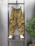 Men's plus size drawstring cargo pants, wide-leg, khaki with side pockets.