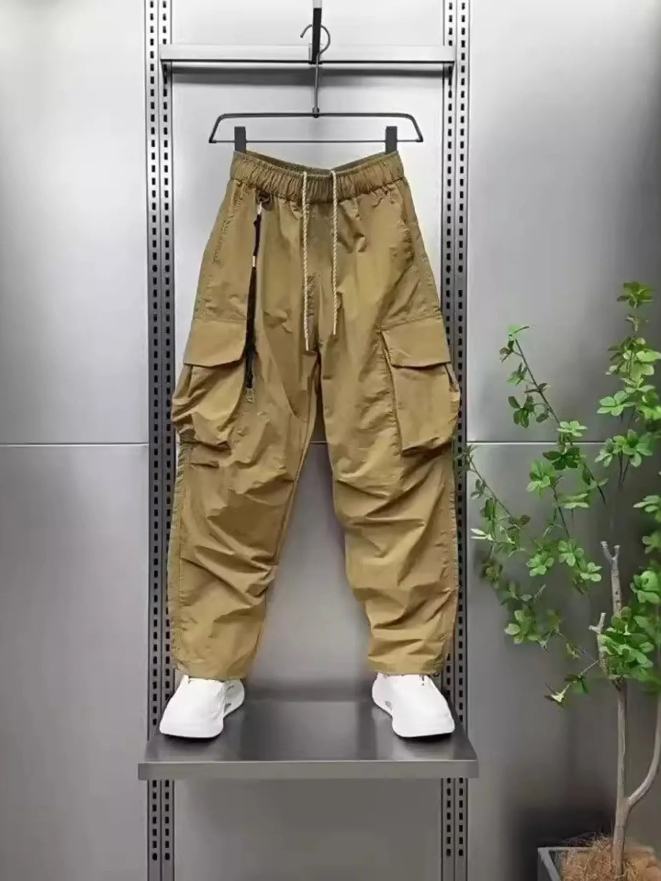 Men's plus size drawstring cargo pants, wide-leg, khaki with side pockets.