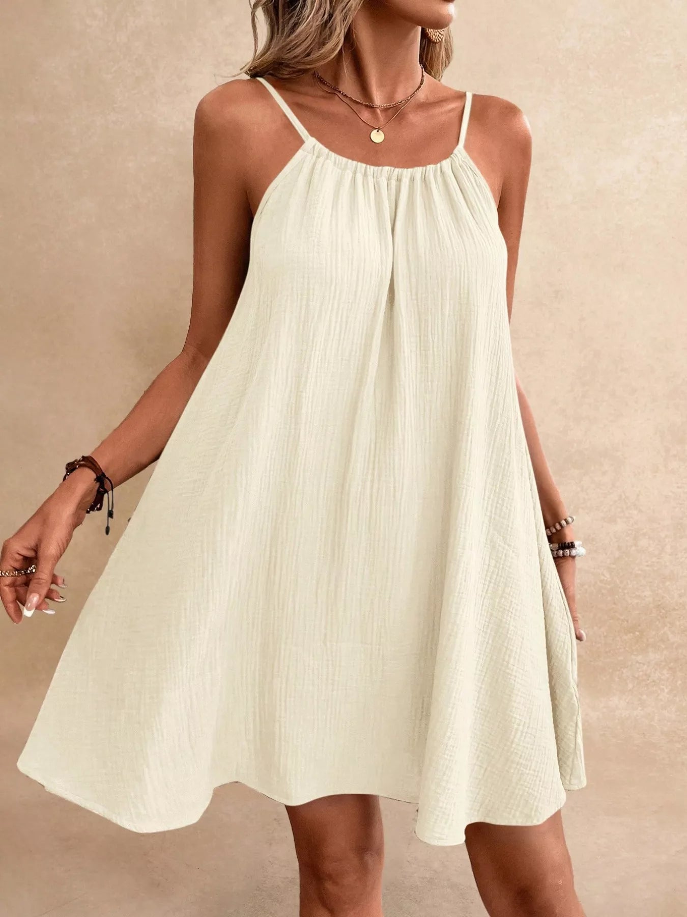 Cedar & Moore cream spaghetti-strap mini dress, loose-fit, backless casual style