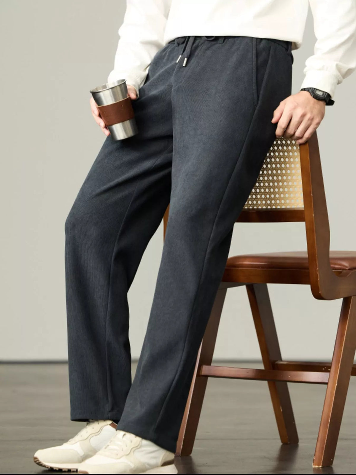 Dark corduroy drawstring relaxed-fit pants, cuffed ankle length