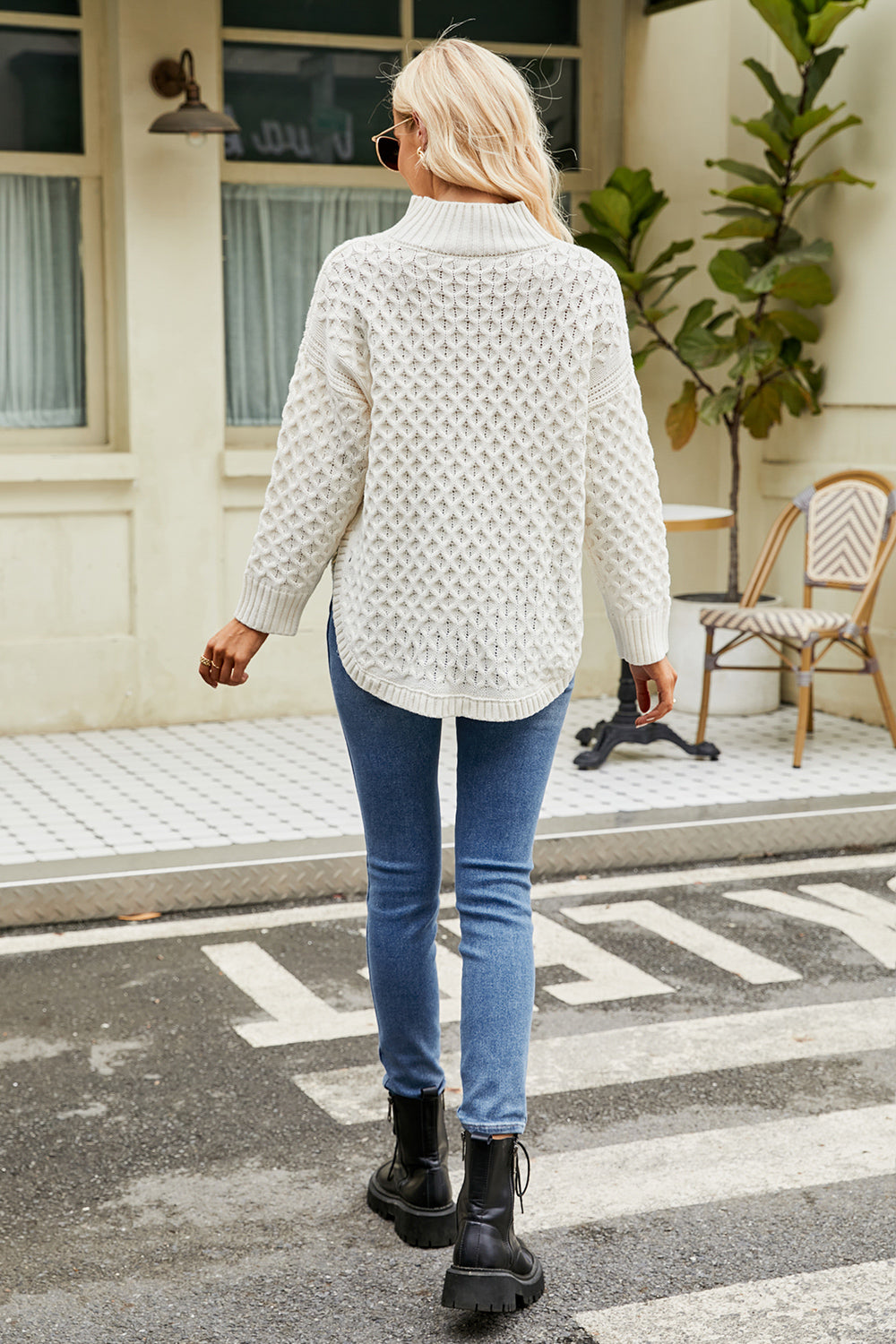 White mock neck long-sleeve sweater with textured diamond knit, back view