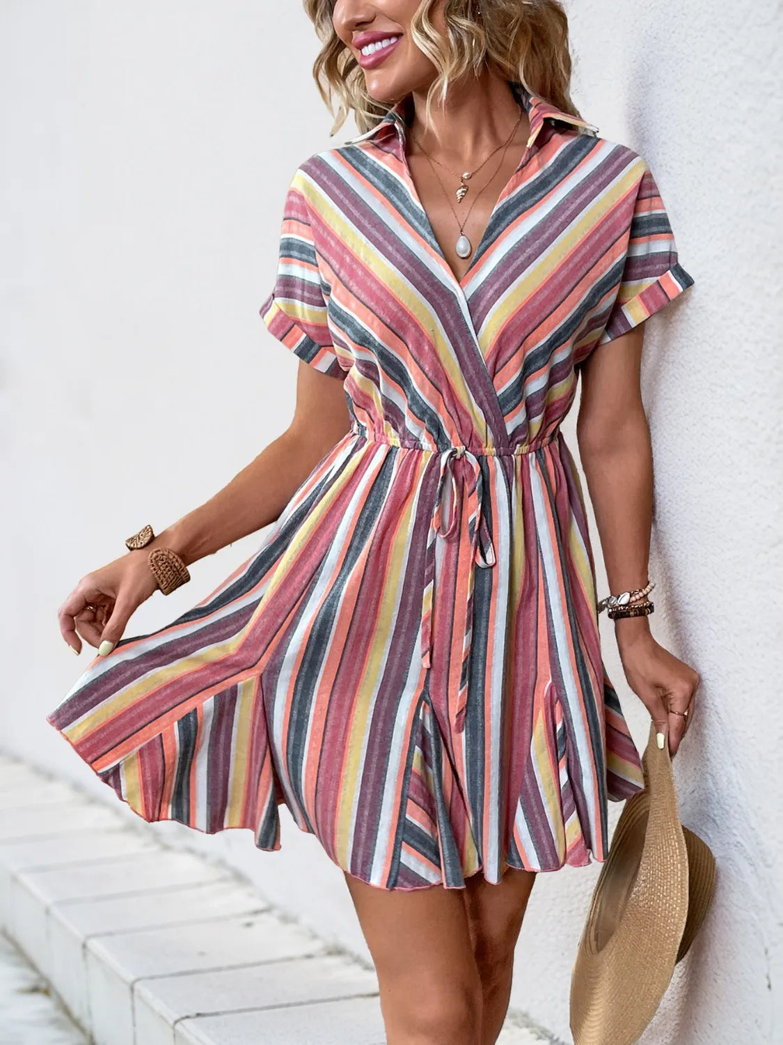 Striped surplice short-sleeve dress by Trendsi, multicolored vertical stripes with waist tie.