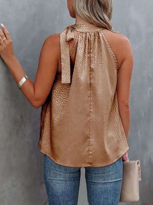 Taupe animal-print halter cami with open back and neck tie strings