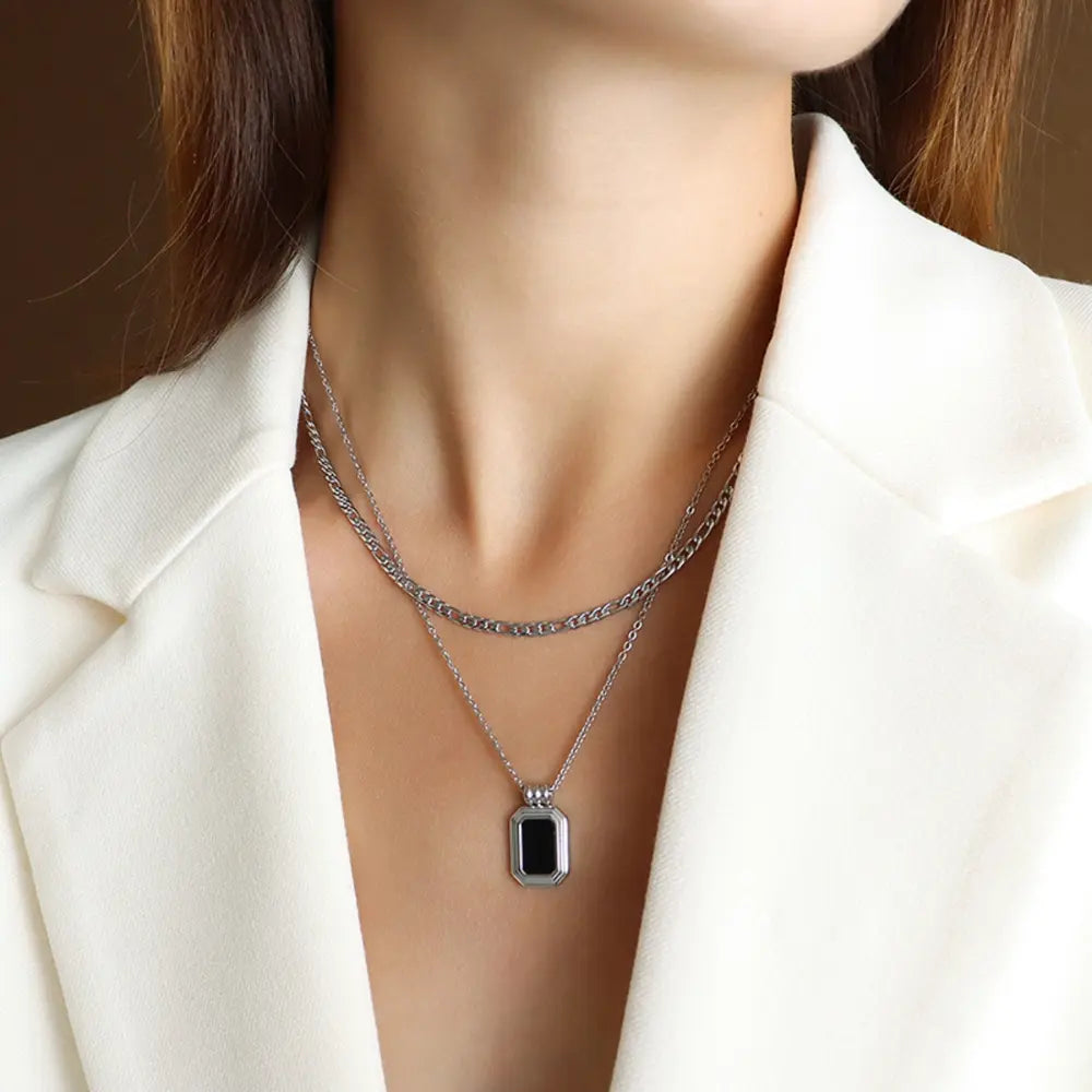 Silver pendant necklace with rectangular black enamel pendant on chain