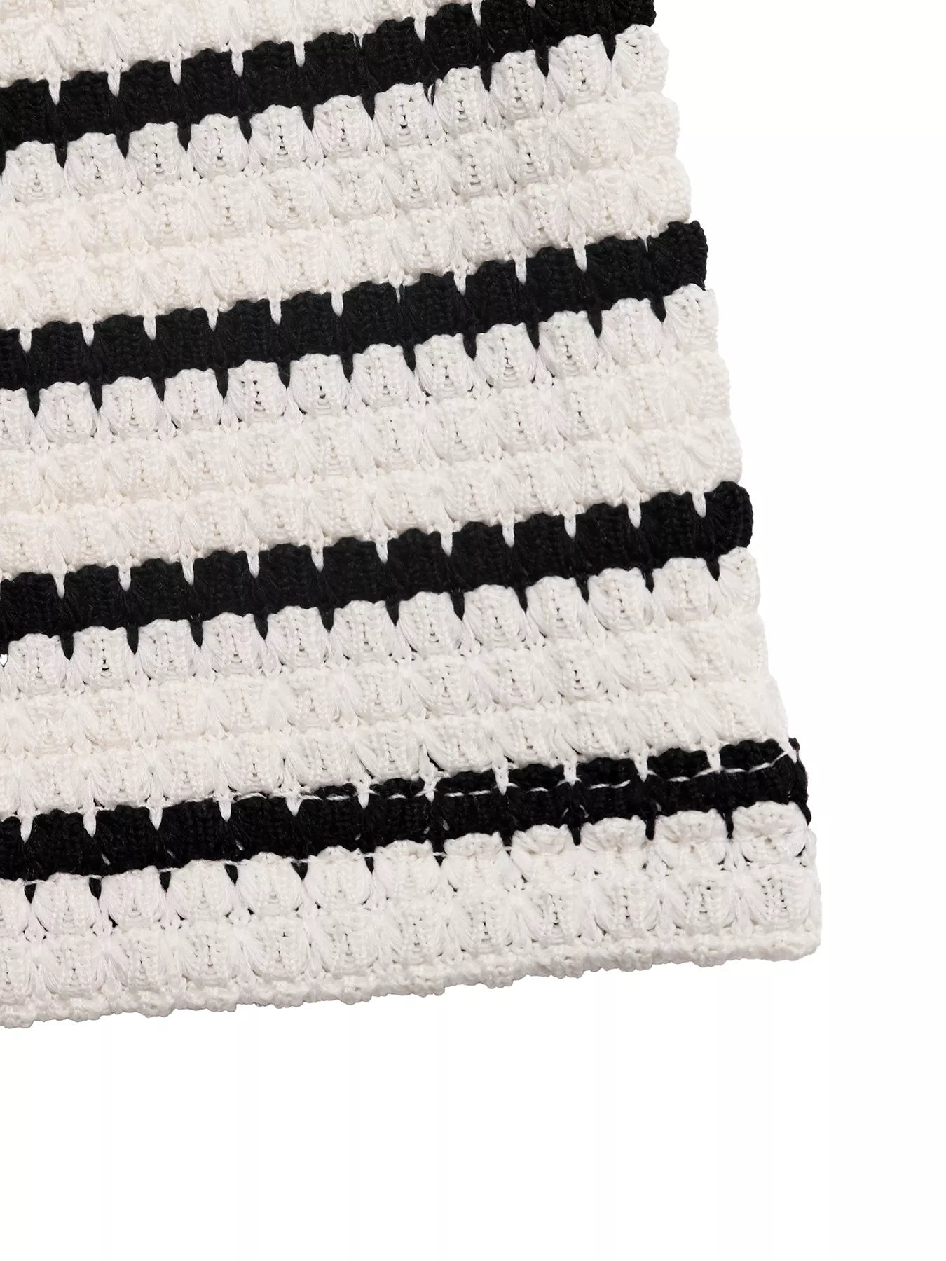 Cedar & Moore Striped Halter Neck Knit Mini Dress in black and white knit fabric close-up