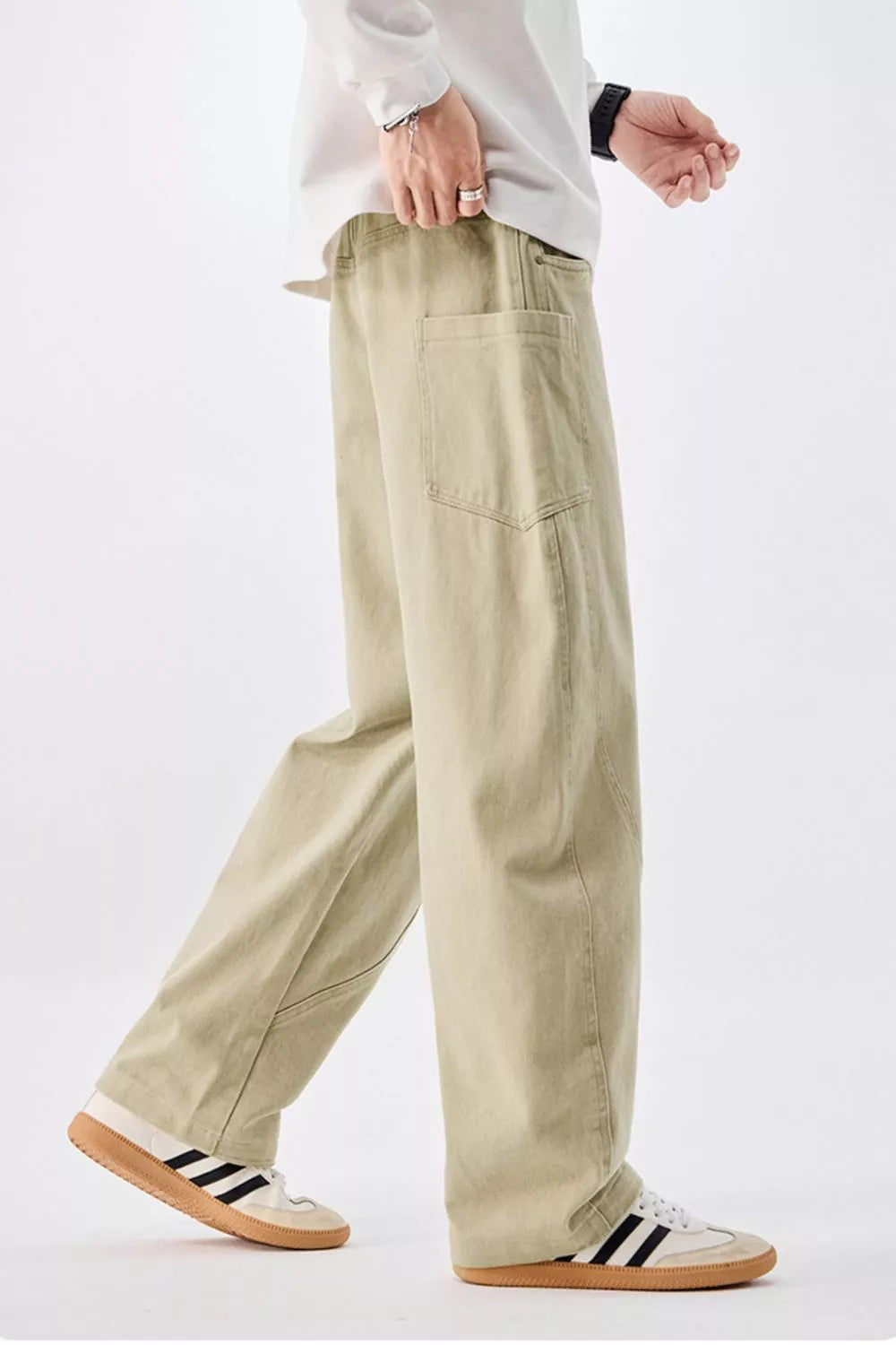 Men's sage cotton drawstring jeans with relaxed straight-leg silhouette