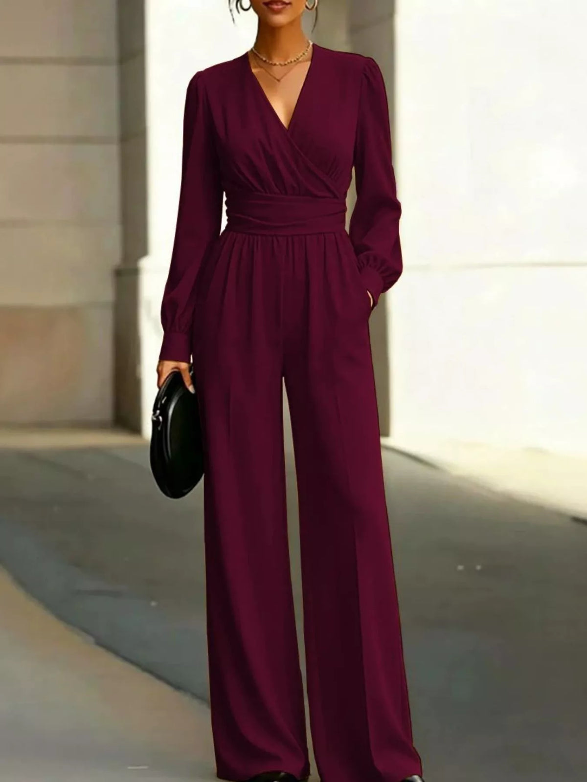 Wine red surplice wide-leg jumpsuit with long sleeves and side pockets