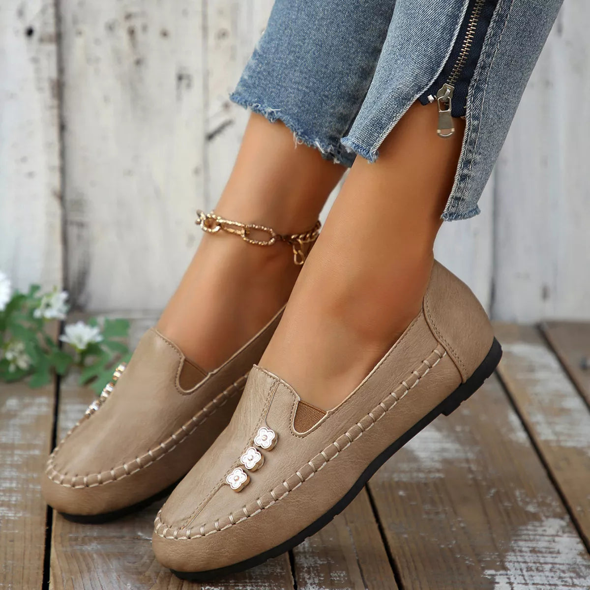 Slip-on round-toe vegan leather flats in khaki with floral accents