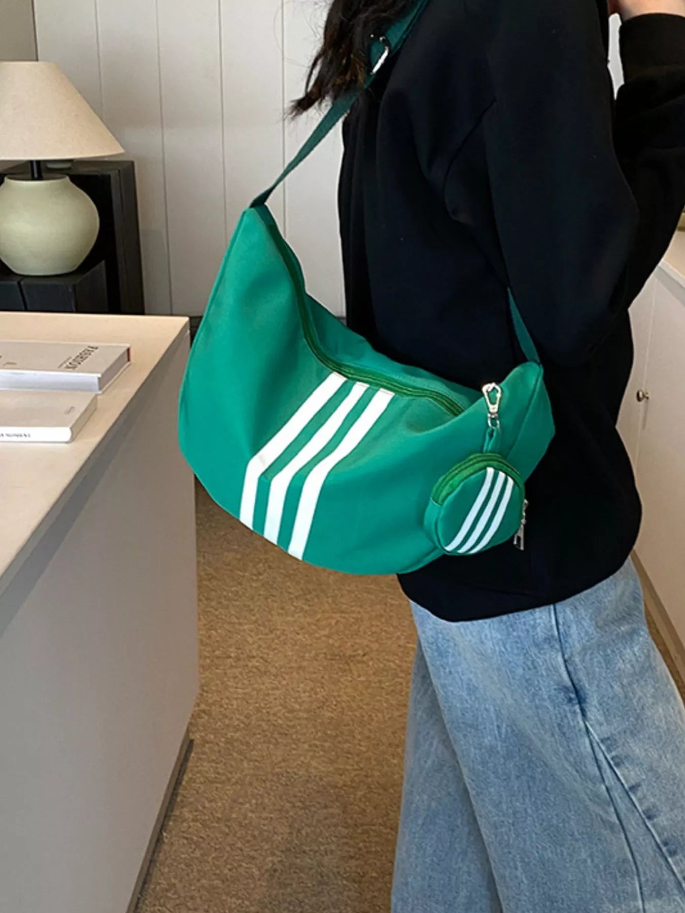 Striped crossbody bag with coin purse in teal green, white stripes, medium size