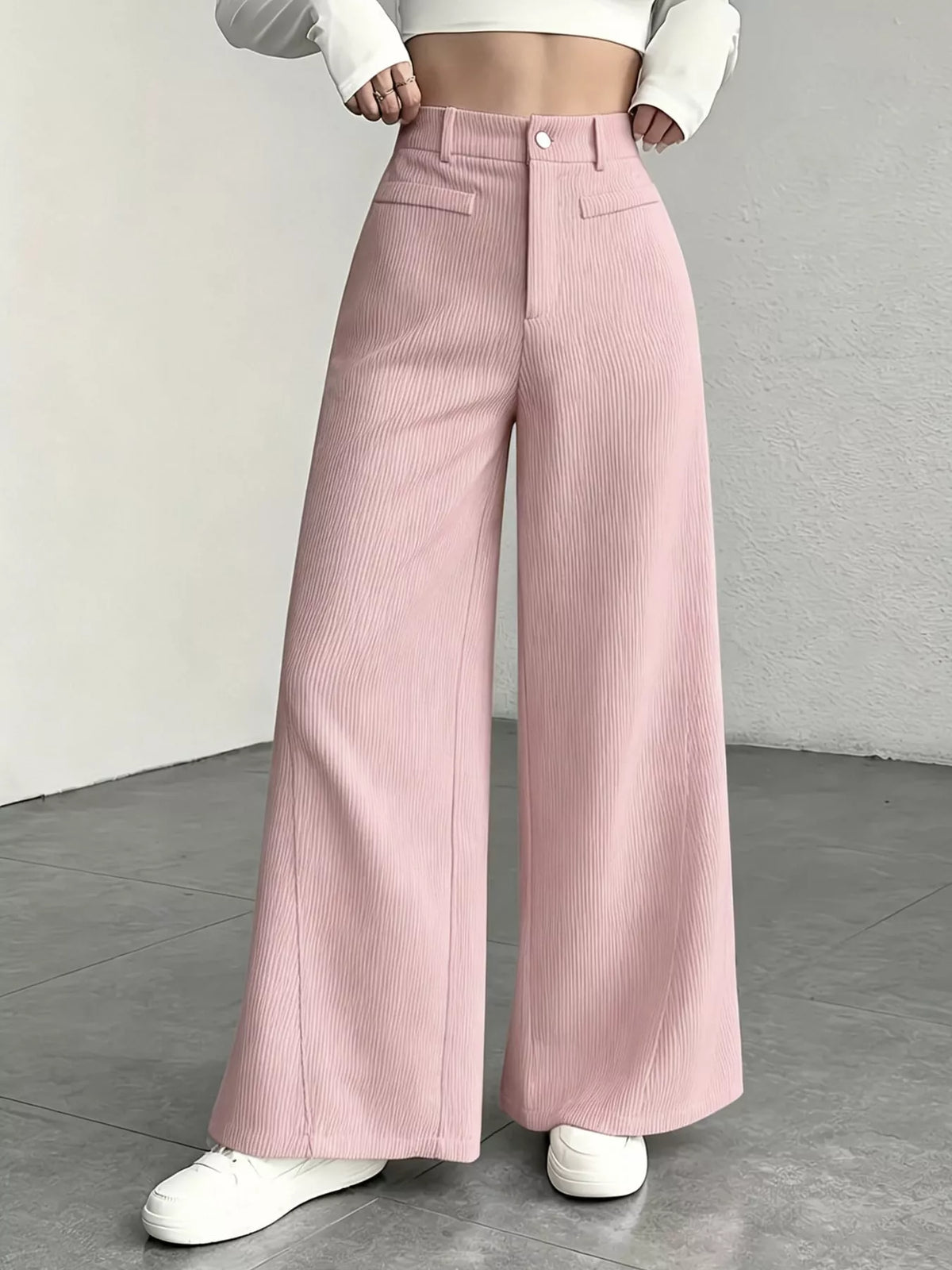 Dusty pink high-waisted wide-leg pants with pockets and button front