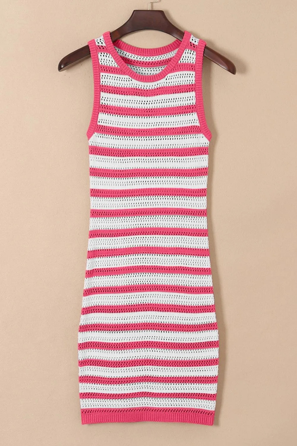 Strawberry pink and white striped sleeveless knit sweater dress on hanger