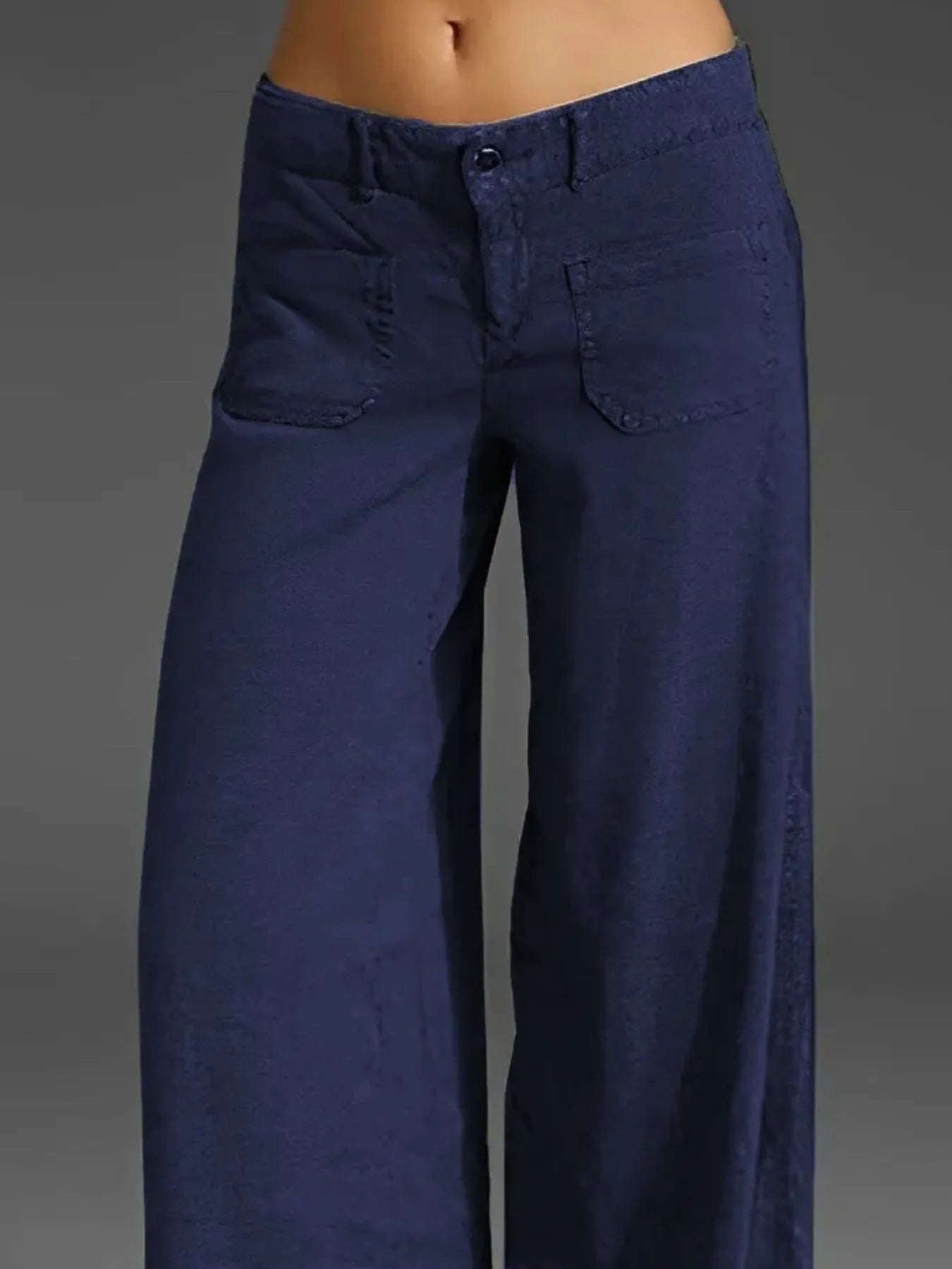 Navy wide-leg pants with pockets, button-front closure, straight wide legs