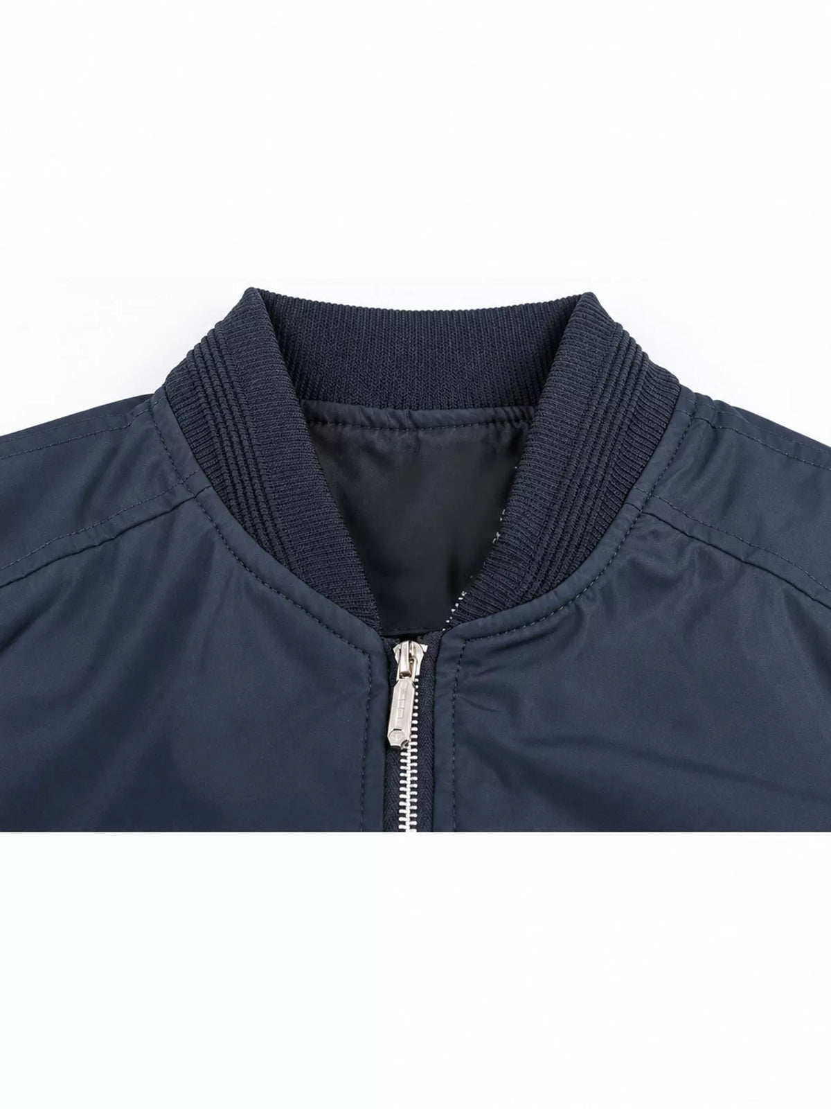 Lightweight men’s bomber jacket in dark blue, close-up of zipper and knit collar