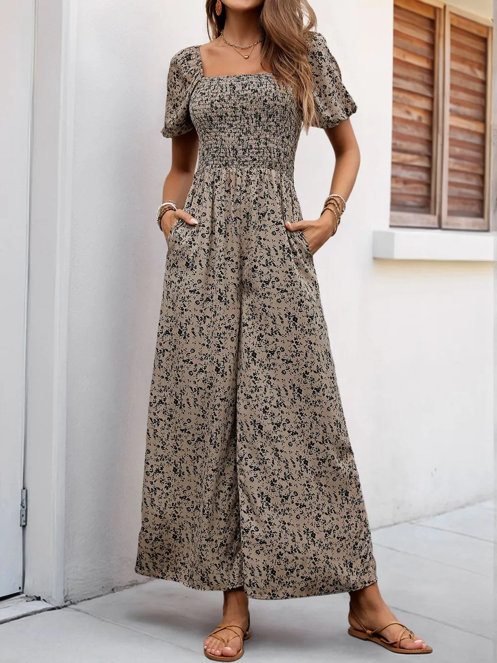 Taupe printed wide-leg jumpsuit with square neckline and puff sleeves
