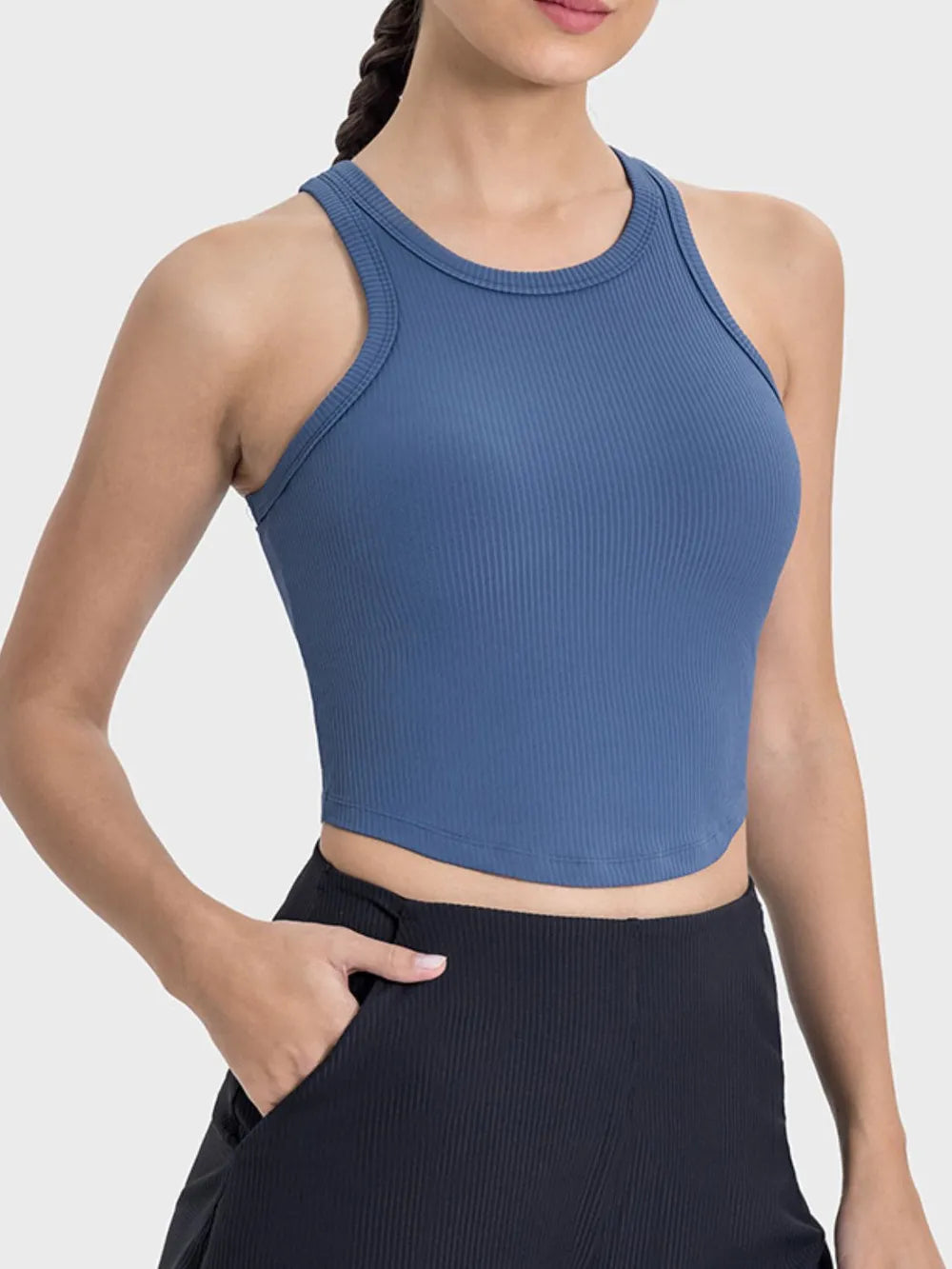 Dusty blue ribbed active tank with round neck racerback, cropped fit