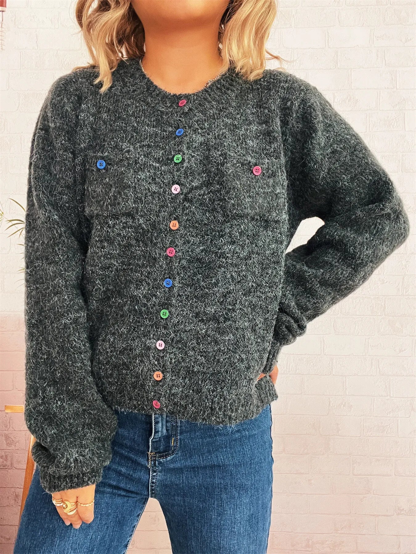 Dark gray button-up cardigan with chest pockets and multicolor button placket