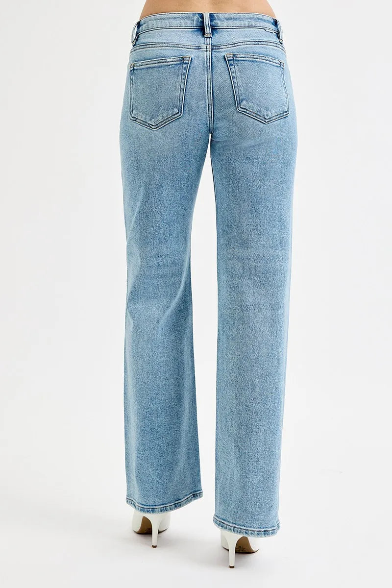 Medium-wash low-rise boyfriend jeans back view with rear pockets and belt loops