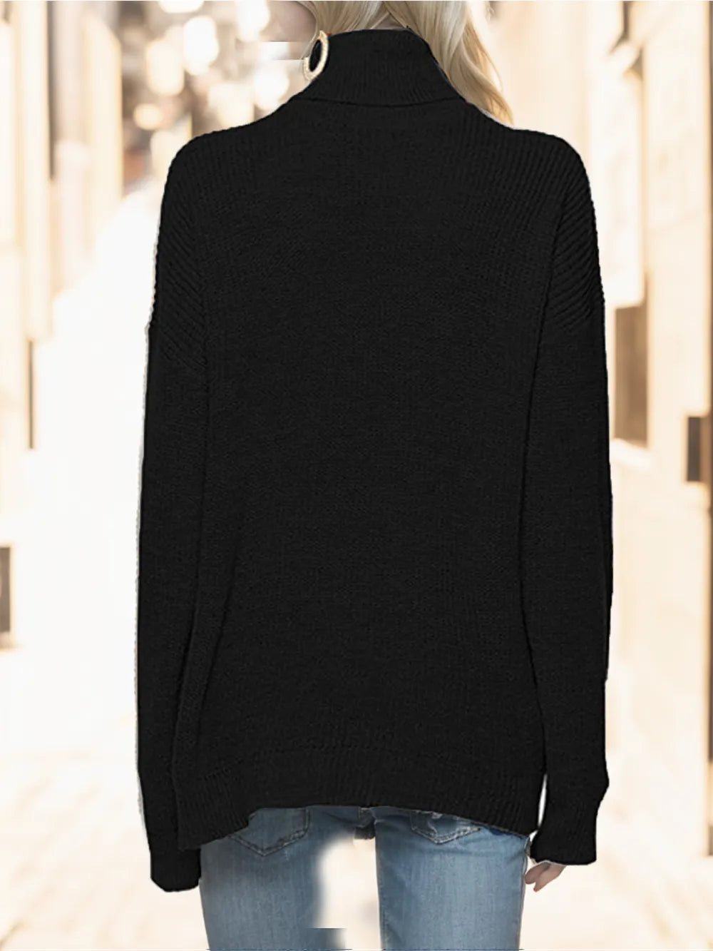 Black turtleneck drop-shoulder sweater with long sleeves and ribbed high neck
