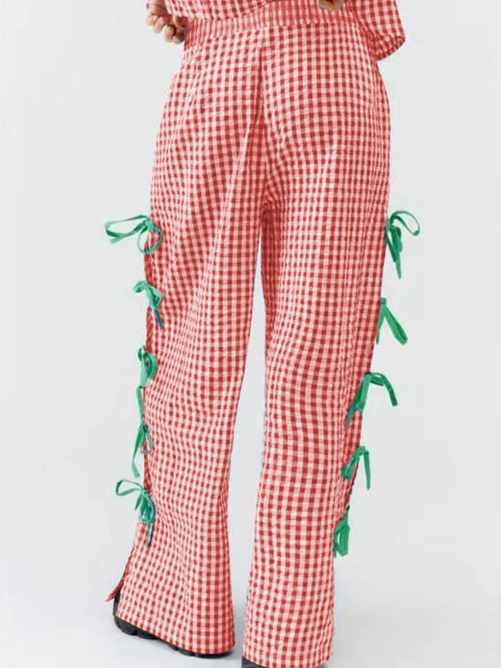 Red gingham plaid wide-leg pants with green side ties and front seam