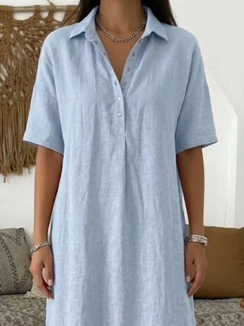 Light blue button-detail half-sleeve midi dress with front button placket