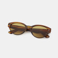 Brown polycarbonate cat-eye sunglasses with dark tinted lenses and slim arms