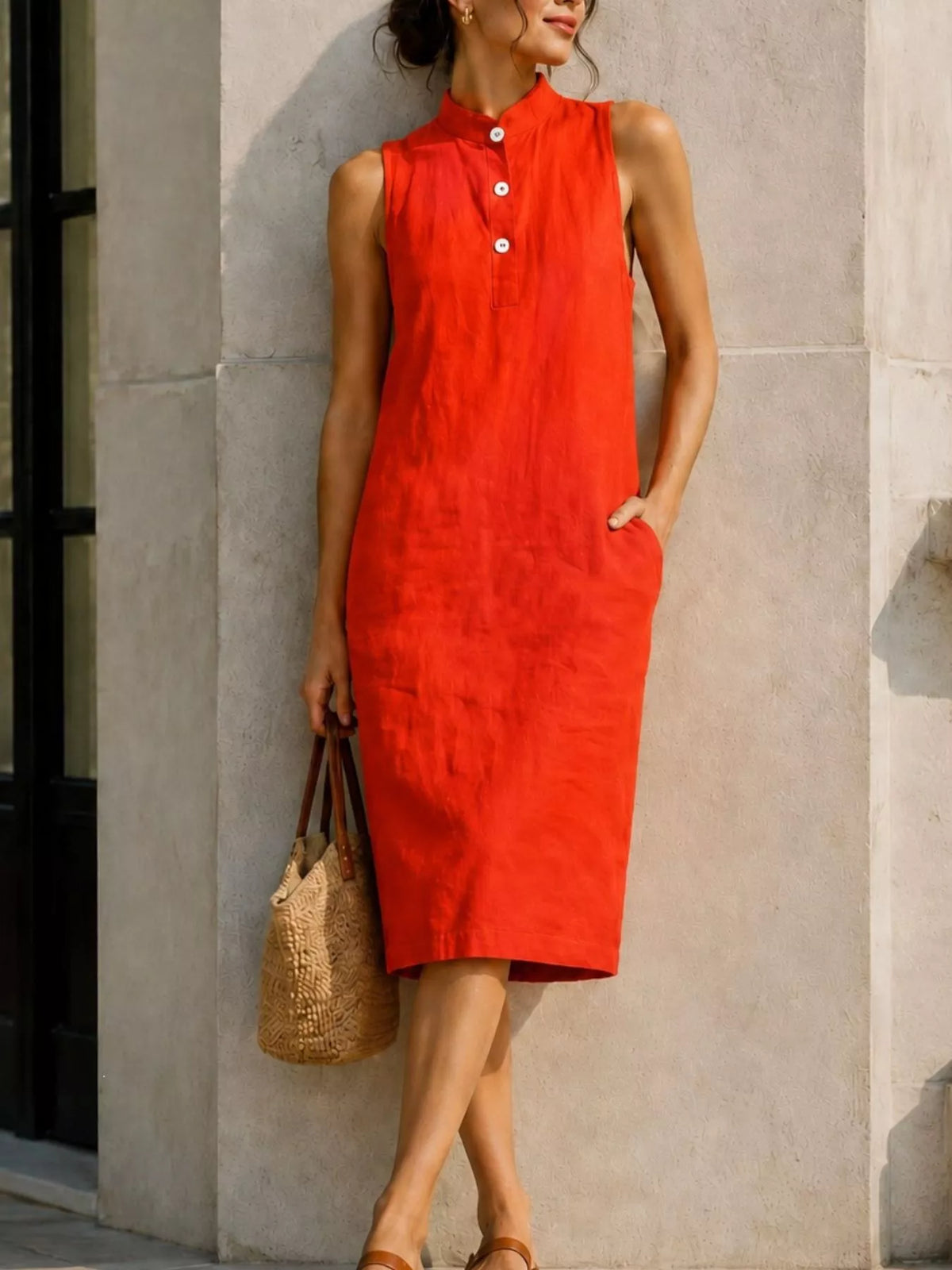 Orange-red sleeveless midi dress with button front and side pockets