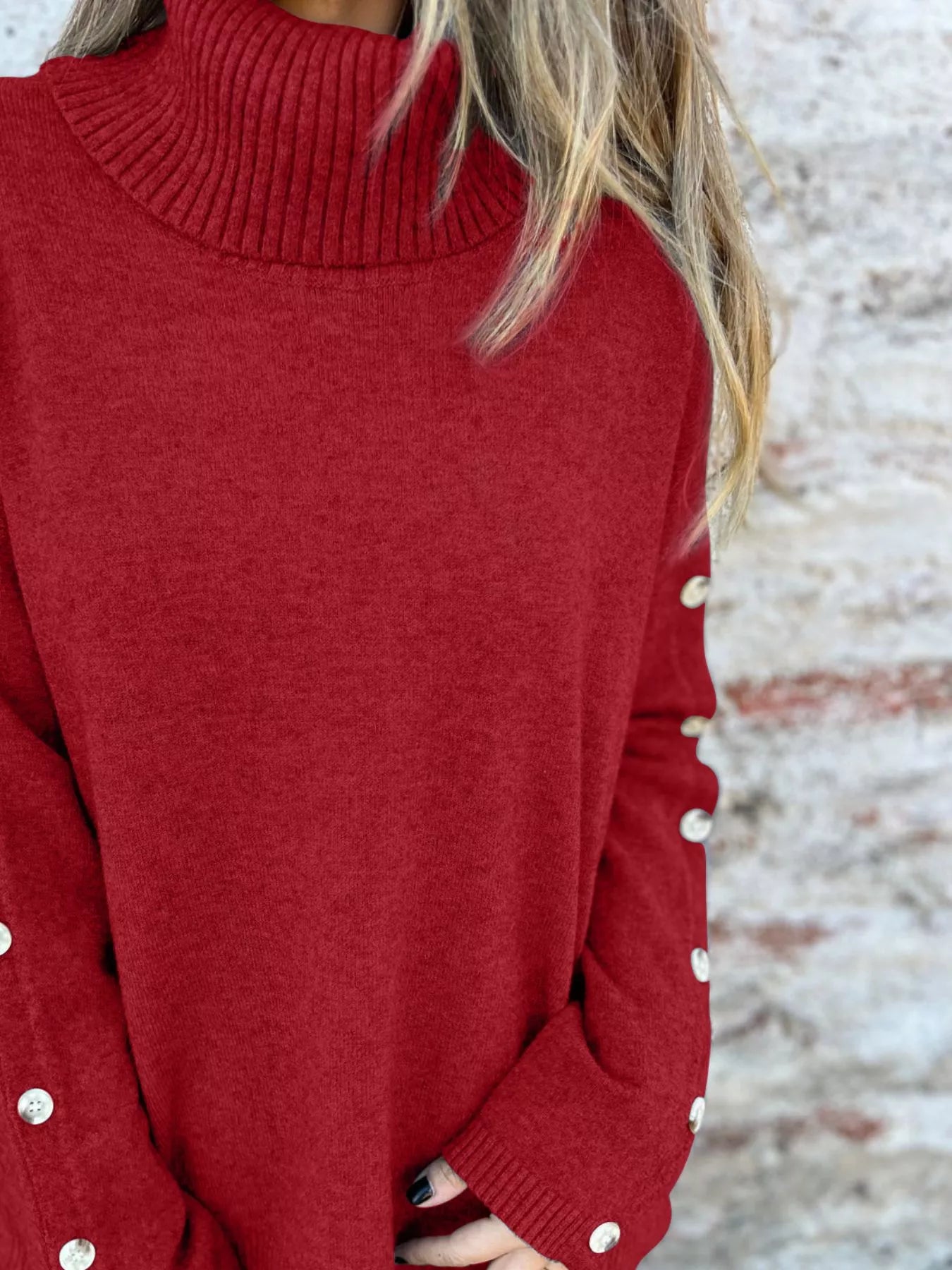 Burgundy turtleneck sweater with ribbed knit and buttoned sleeve cuffs