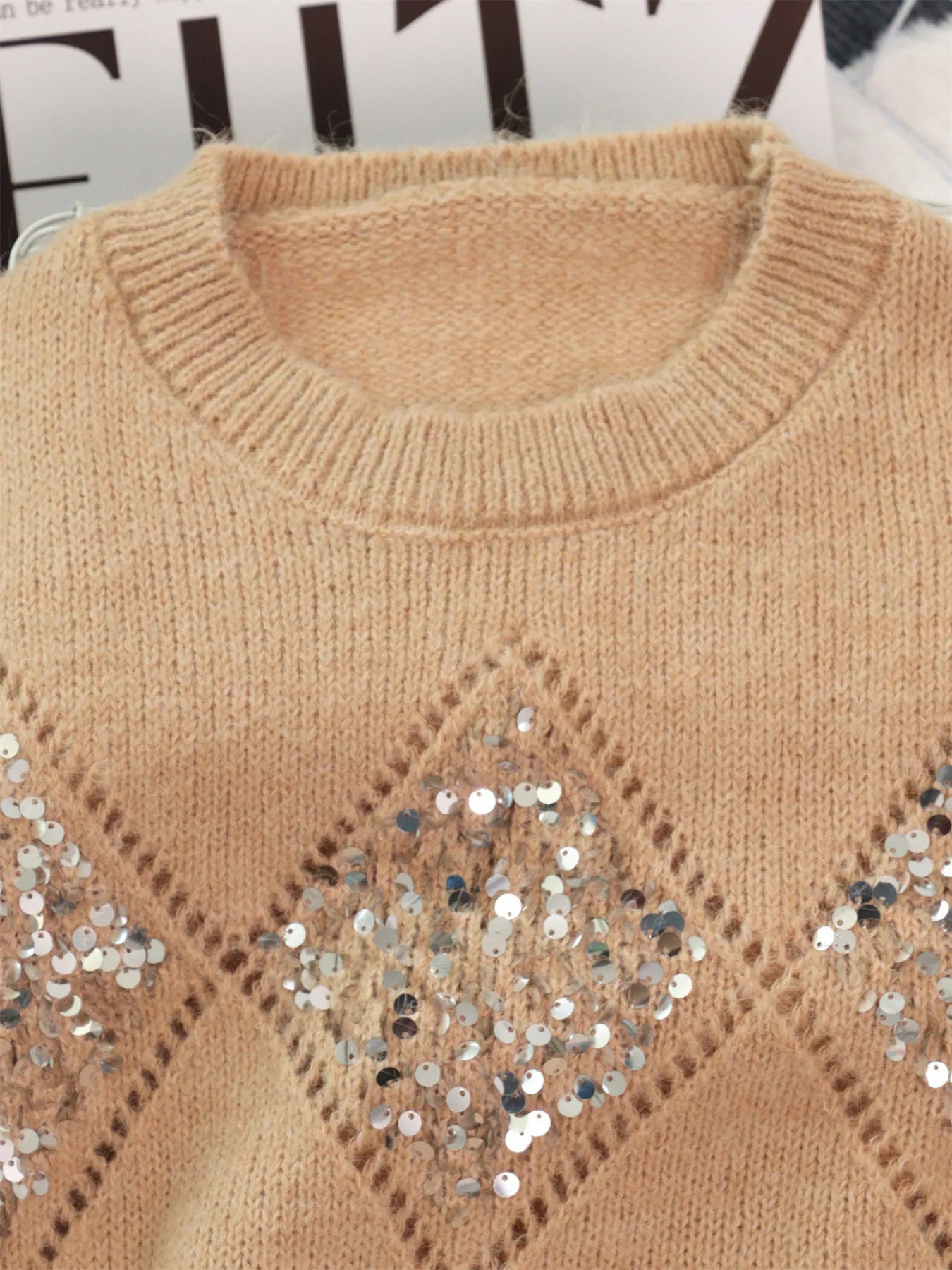 Khaki knit sweater with sequined diamond motif and ribbed crew neckline