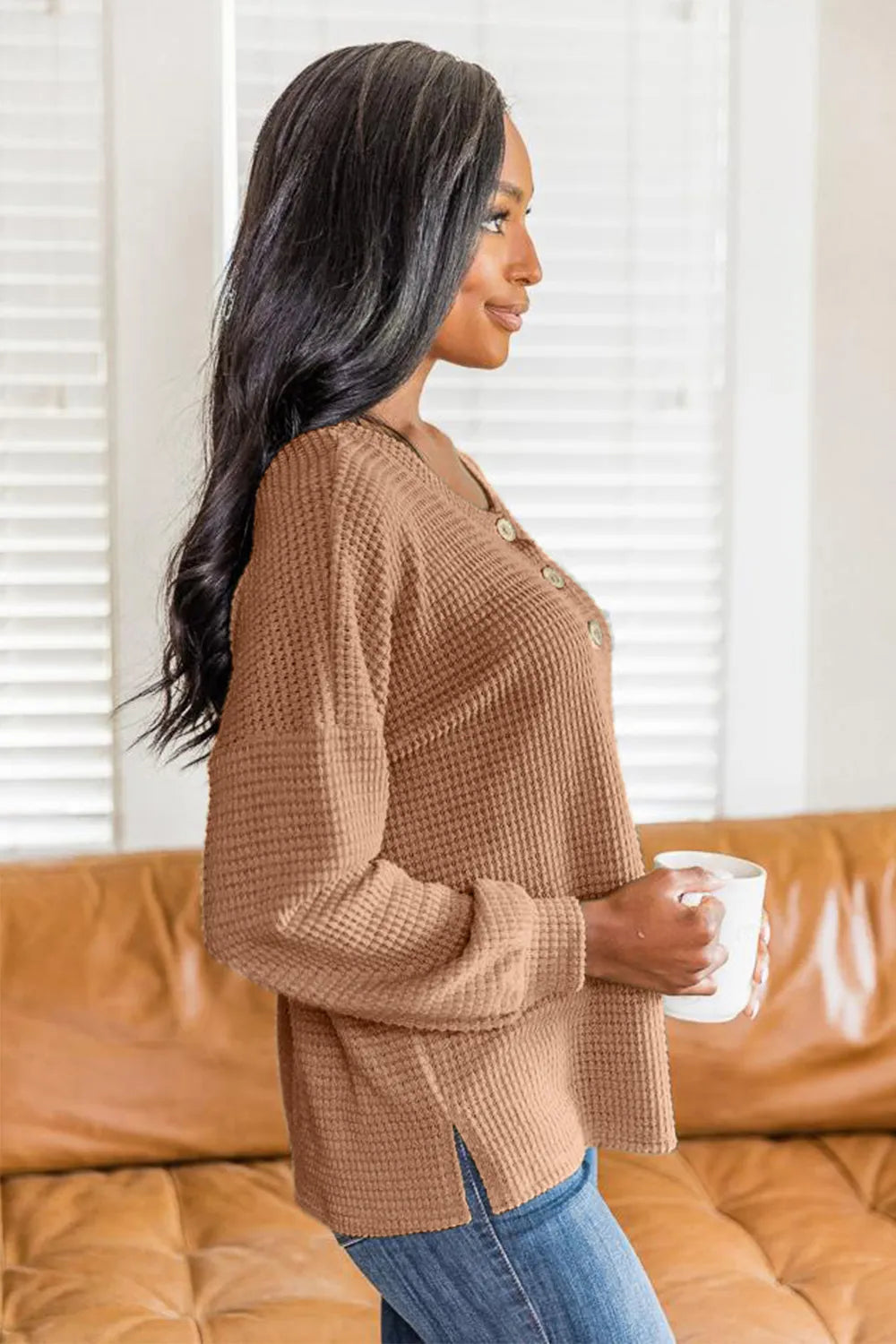 Camel waffle knit long sleeve henley top with button placket and side slit