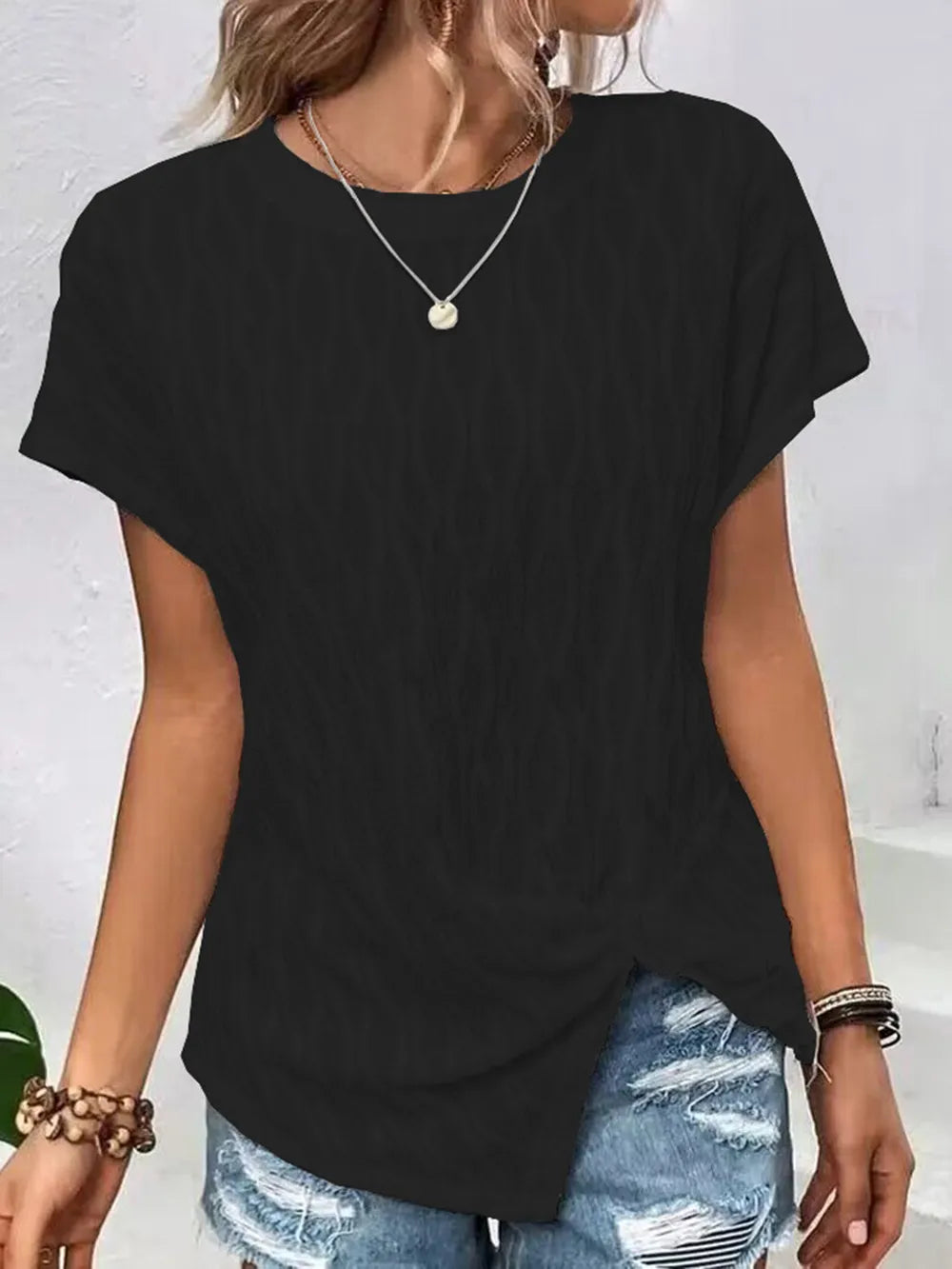 Round-neck short-sleeve T-shirt in black, draped fit with crew neckline