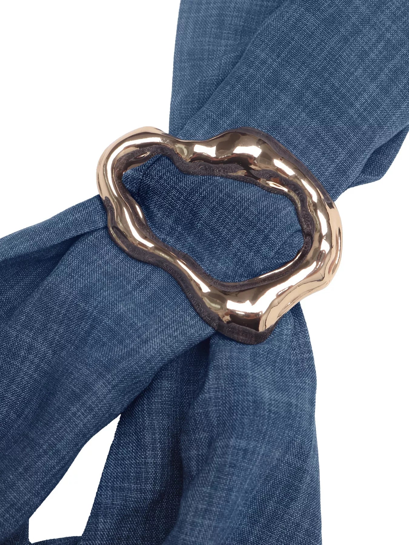 Heart-shaped metal buckle on navy halter neckline strap