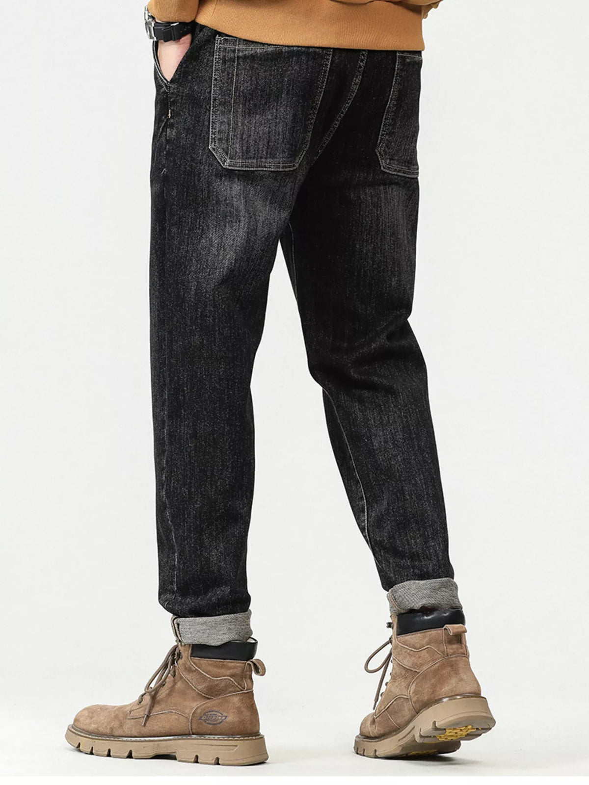 Men's relaxed fit vintage wash black cotton jeans with front pockets and belt loops