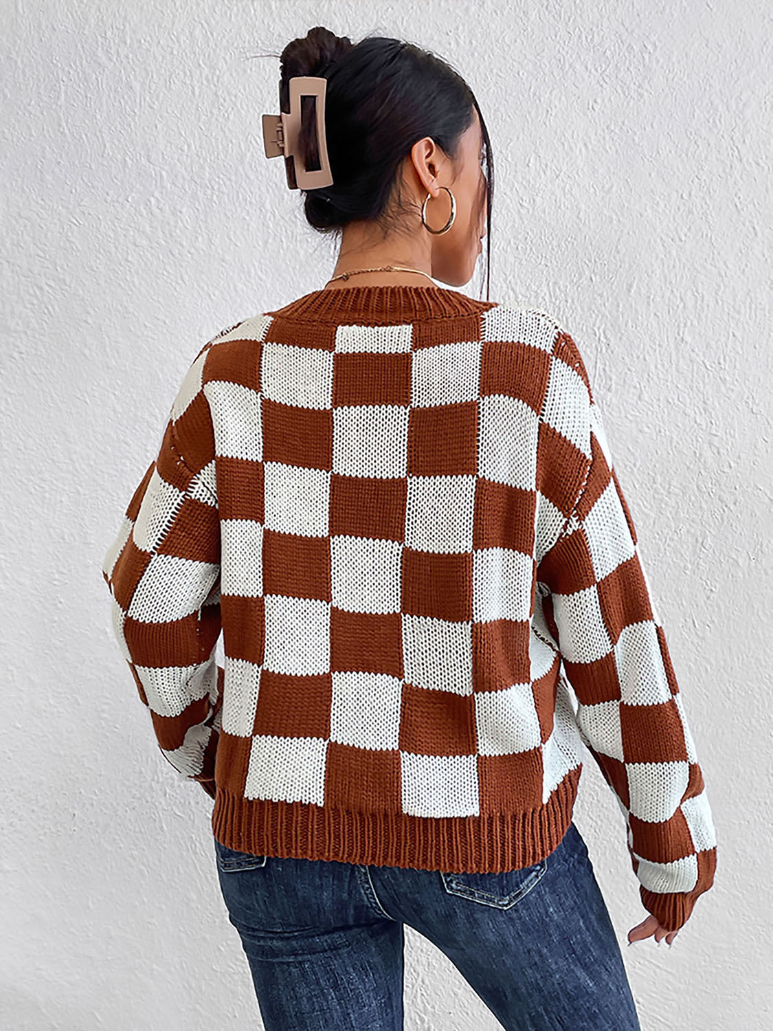 Chestnut and white checkered knit sweater, back view, long sleeves