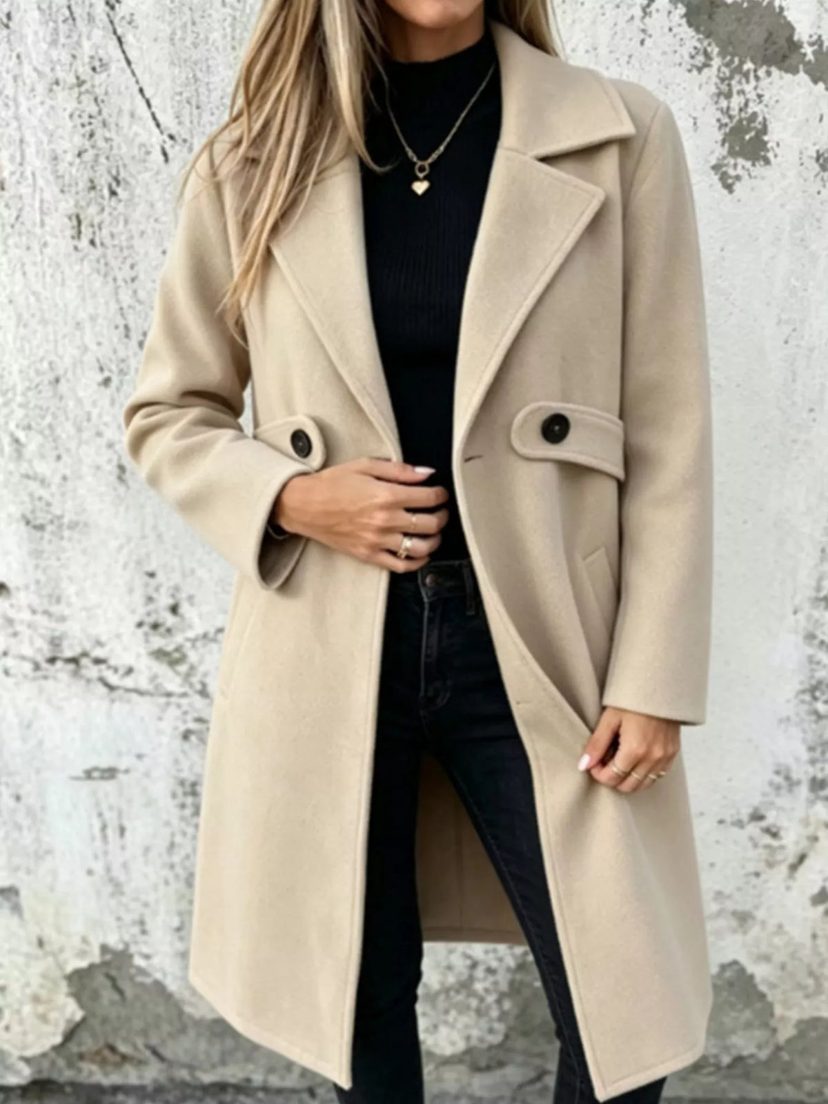 Light beige longline button-lapel coat with two flap pockets and front buttons