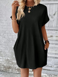 Black pocketed round-neck short-sleeve dress with relaxed fit and side pockets