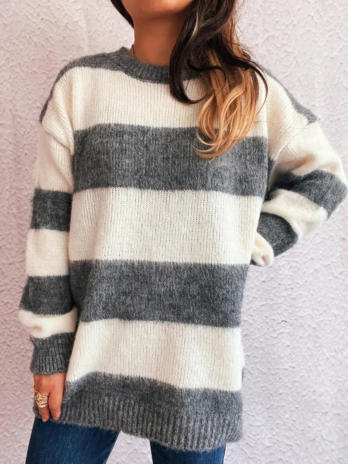 Striped long sleeve sweater with dark gray and white bands, crew neck