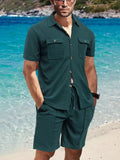 Men's short-sleeve button-down and shorts set in deep teal; chest pockets, button front