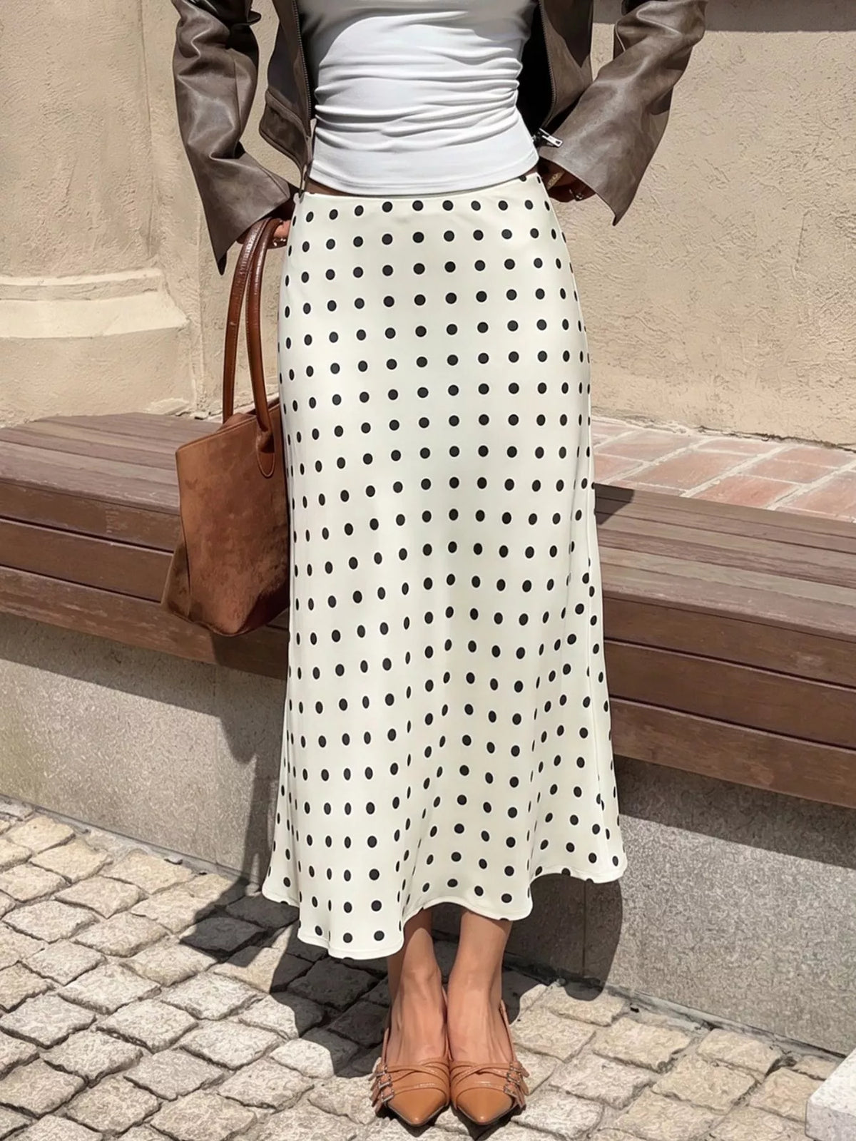 Beige polka dot stretch midi skirt, front view with gathered elastic waist