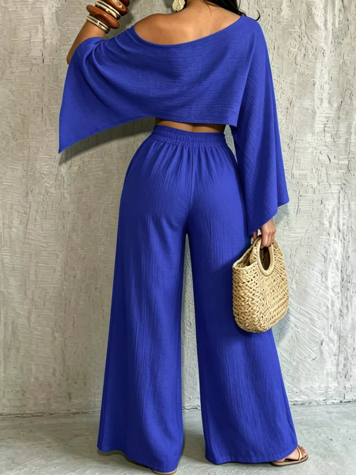 Women’s blue boat-neck crop top and wide-leg pants set, elastic-waist drape