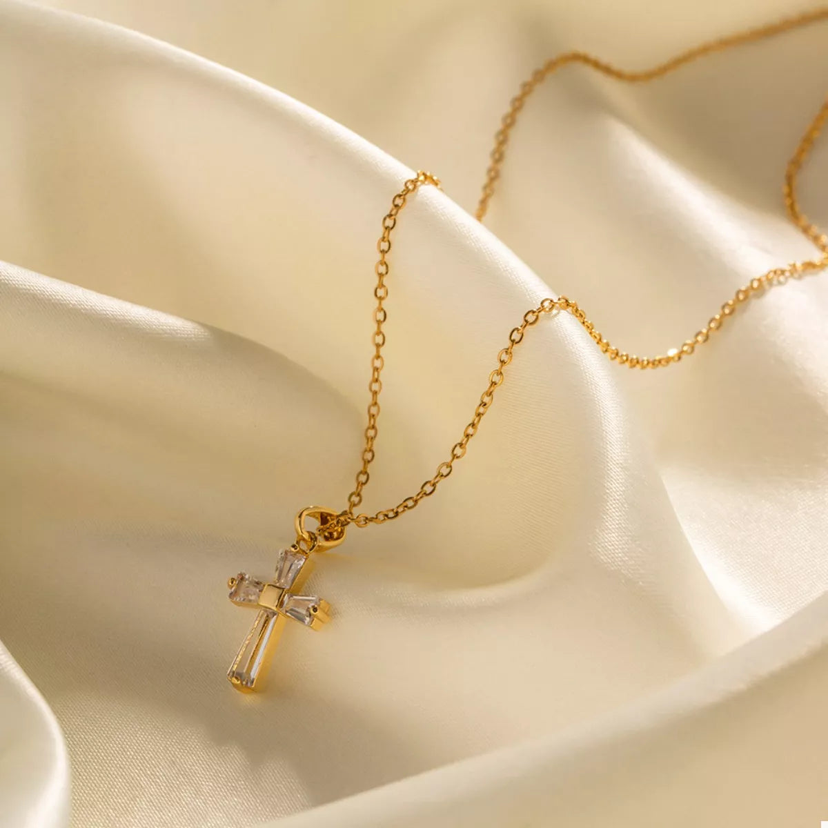 Gold-plated zircon cross necklace with elongated cross pendant and fine gold chain