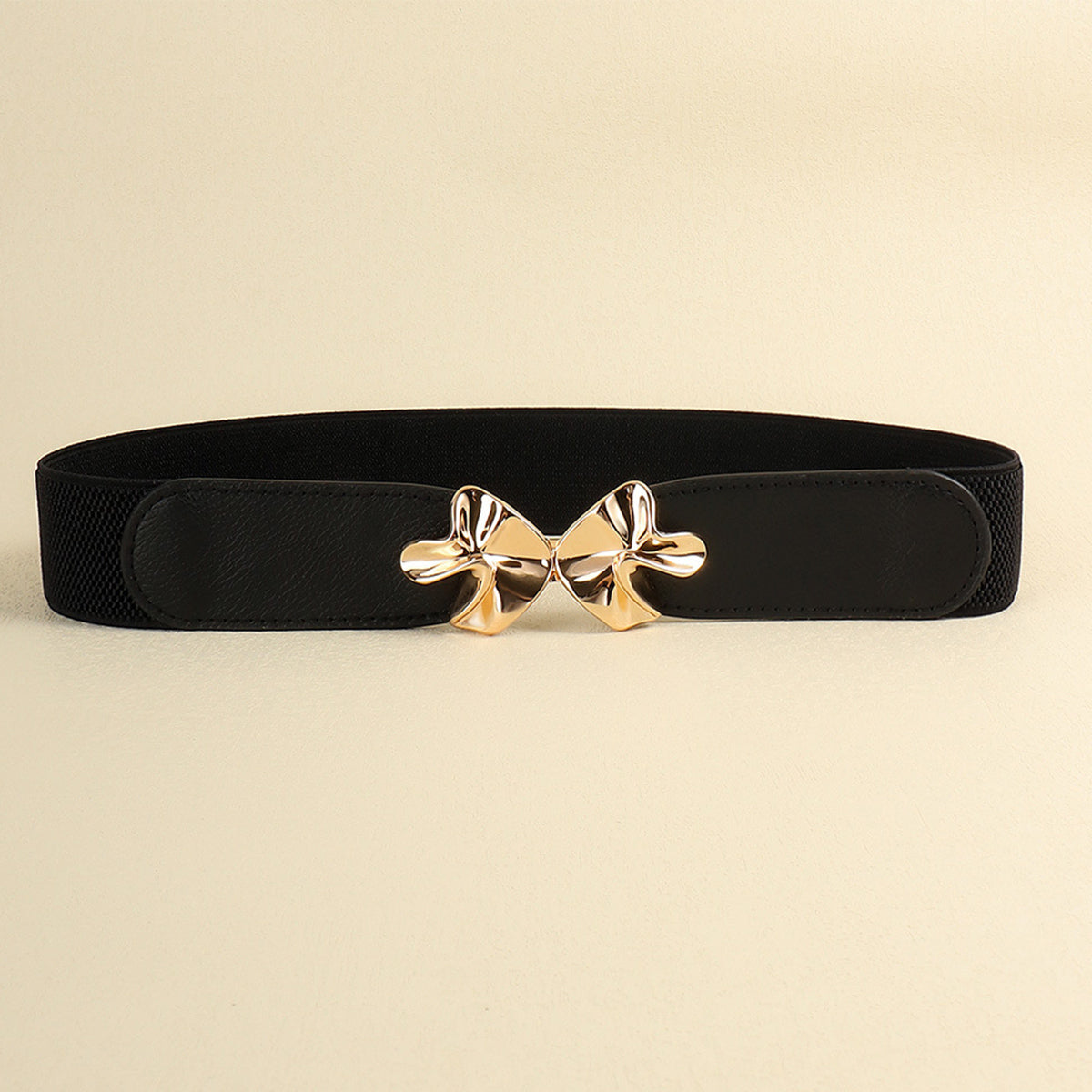 Black elastic belt with gold bow buckle centerpiece