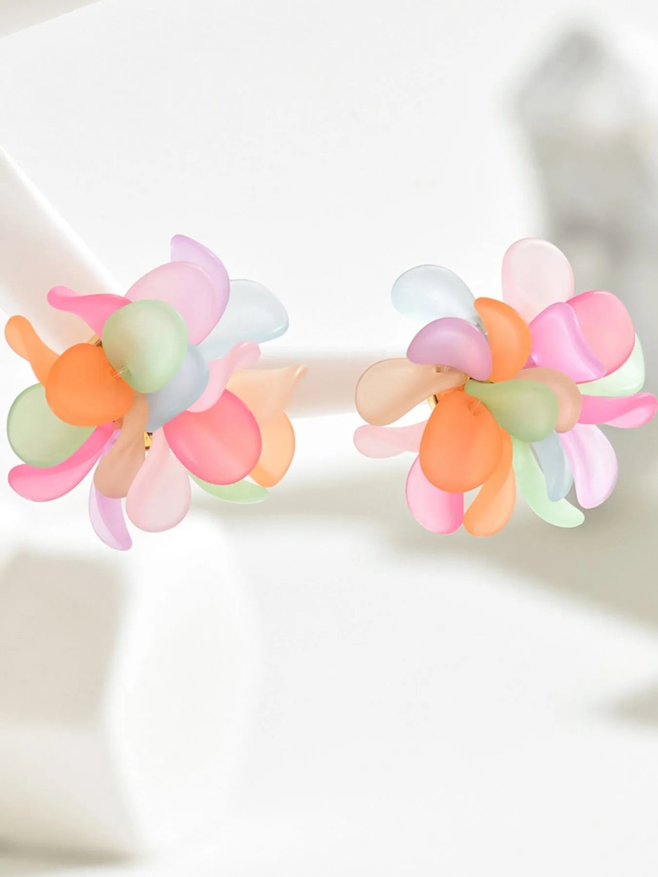 Pair of acrylic flower stud earrings with pastel petals and gold-tone posts