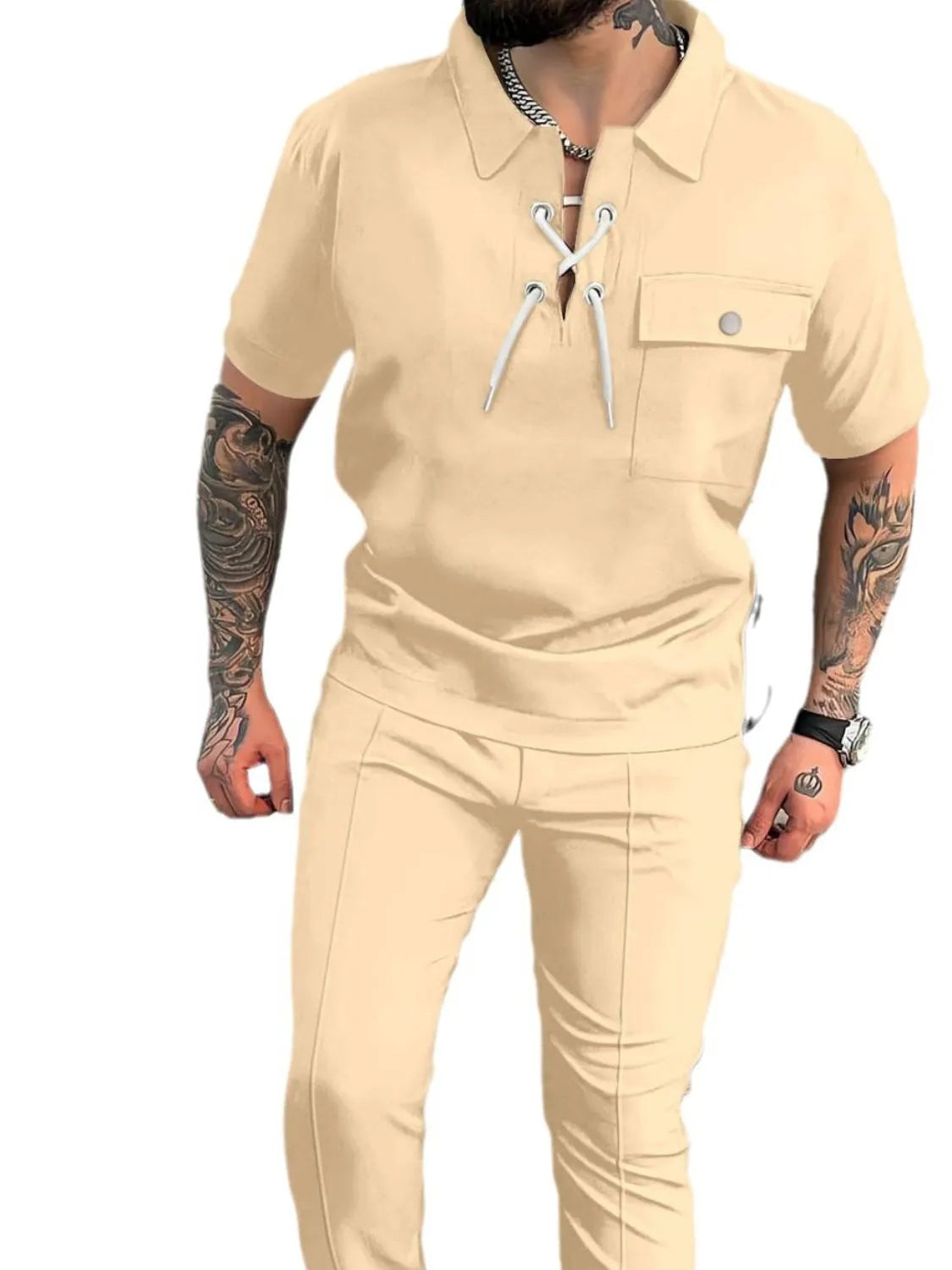 Men's two-piece short sleeve top and jogger pants set in tan, chest pocket and lace-up drawstring