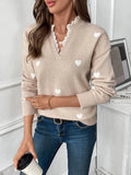 Light khaki v-neck long sleeve sweater with white heart print and ribbed cuffs