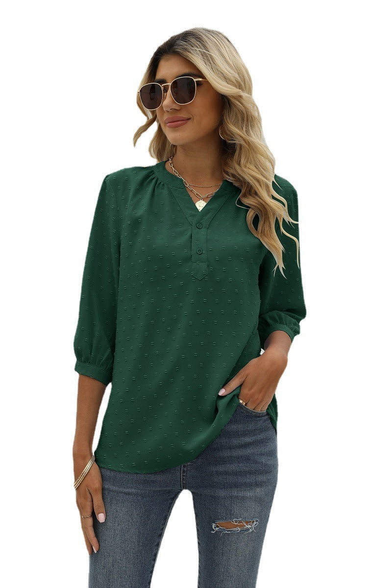 Forest green Swiss-dot notched-neck blouse with 3/4 puff sleeves and button placket