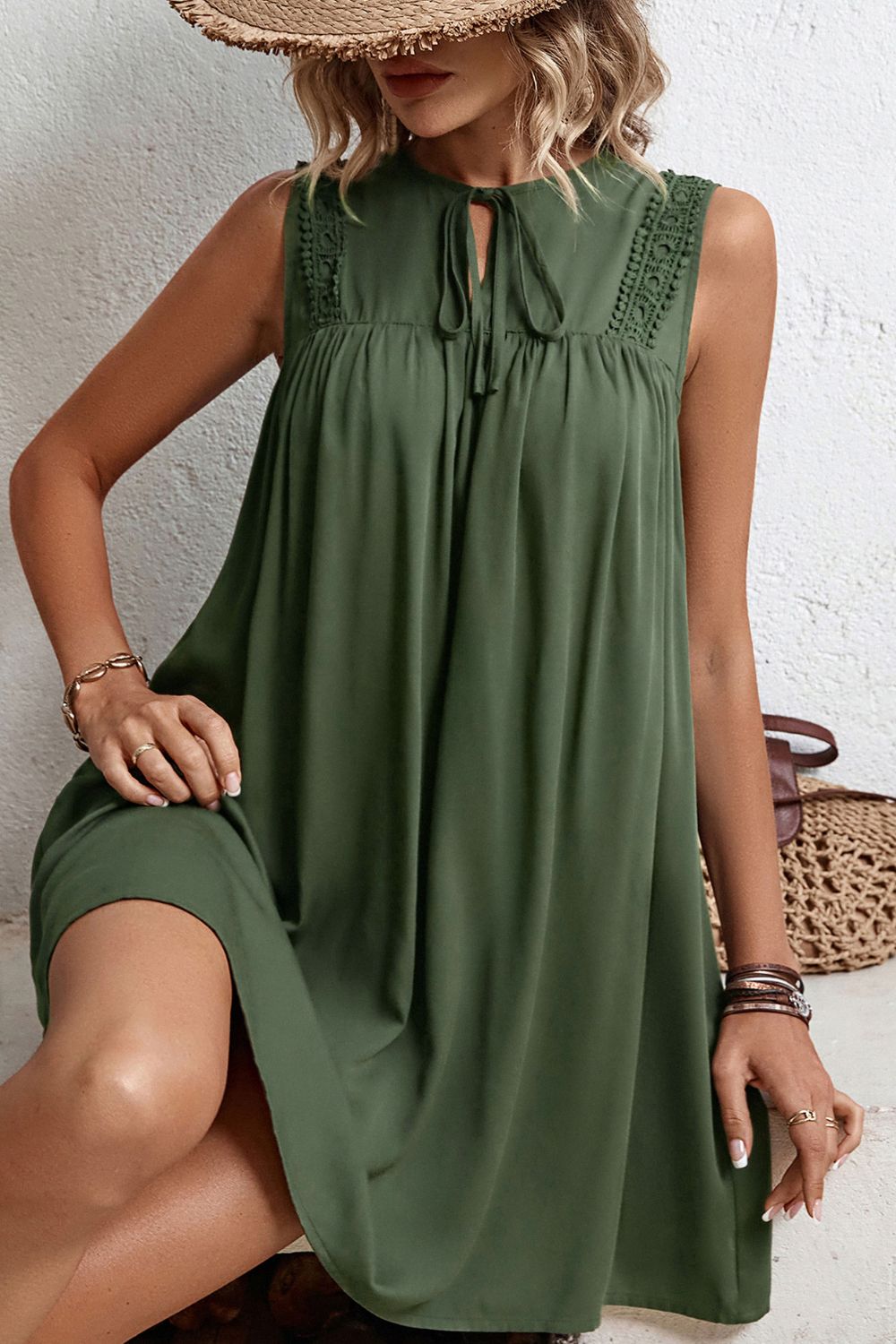 Army green sleeveless dress with gathered yoke and keyhole tie neckline, loose fit