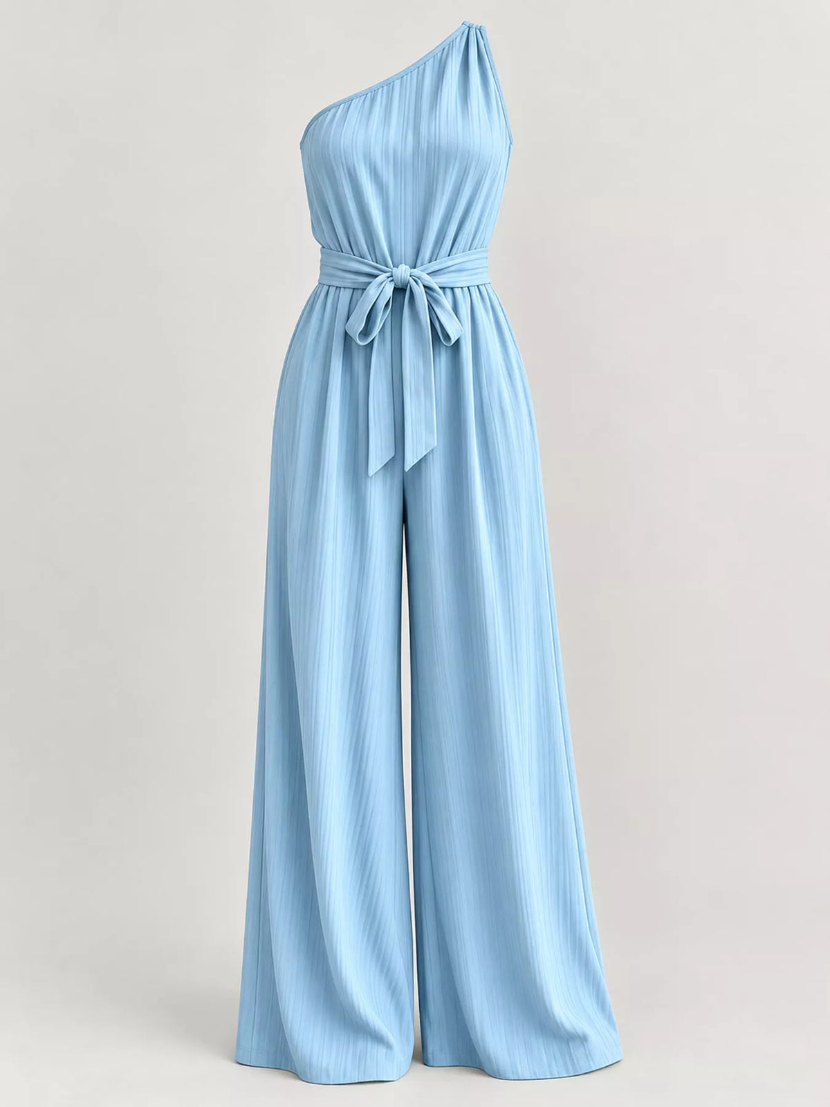 Light blue one-shoulder pleated jumpsuit with ribbon bow tie at waist