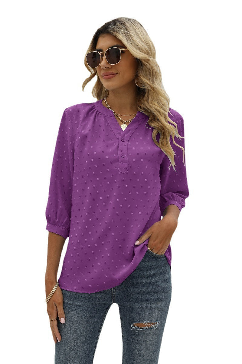 Purple Swiss-dot notched-neck blouse with 3/4 puff sleeves and button placket
