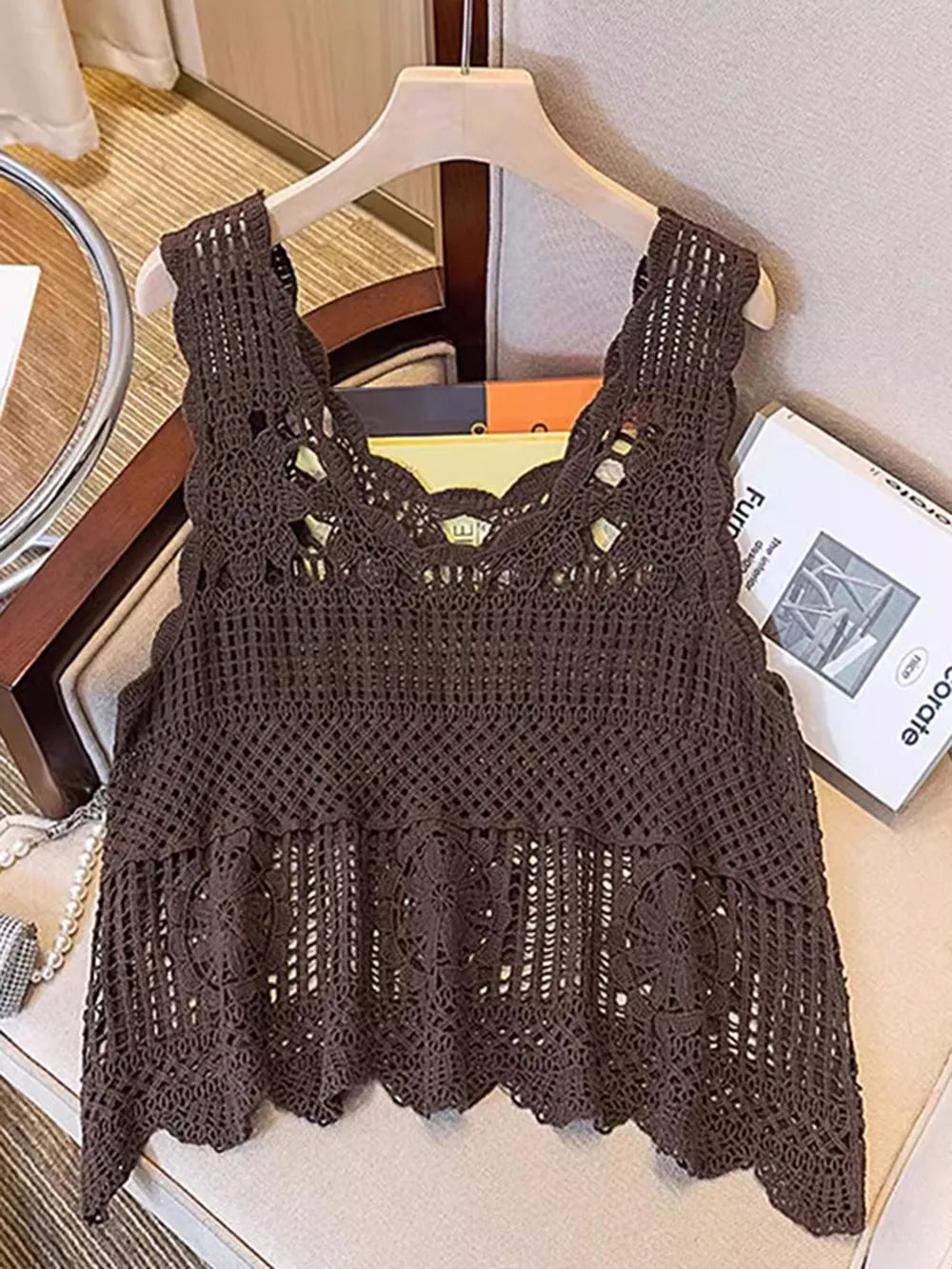 Openwork scoop-neck tank in dark brown crochet on hanger with scalloped hem
